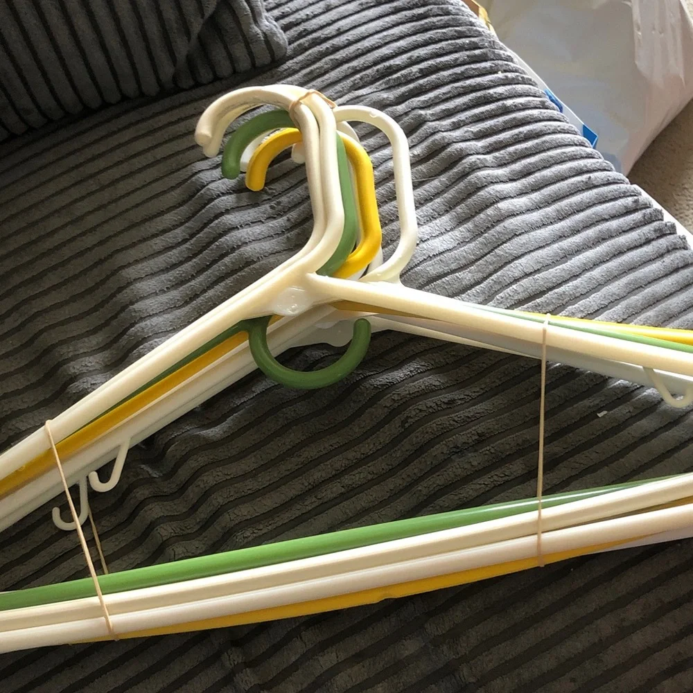 Set of Colorful Plastic Clothing Hangers - White, Yellow, Green